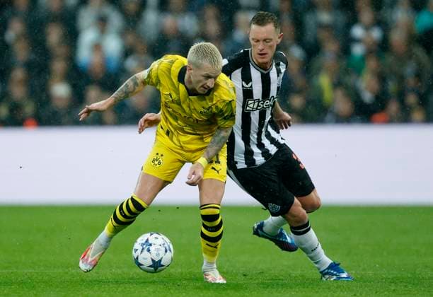 Newcastle United FC v Borussia Dortmund: Group F - UEFA Champions League 2023 24 Marco Reus of Borussia Dortmund and Sean Longstaff of Newcastle United challenge during the UEFA Champions League match between Newcastle United FC and Borussia Dortmund at St. James Park on October 25, 2023 in Newcastle Upon Tyne, England. Newcastle St. James Park England United Kingdom Copyright: xRichardxSellers Sportsphoto APLx 13958513
