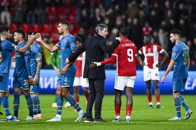Antwerp s head coach Mark van Bommel and Antwerp s George Ilenikhena look dejected after losing a soccer game between Belgian Royal Antwerp FC and Portuguese FC Porto, Wednesday 25 October 2023 in Antwerp, on day three of the Champions League group stage, in the group H. TOM GOYVAERTS TomxGoyvaerts  x78531366x