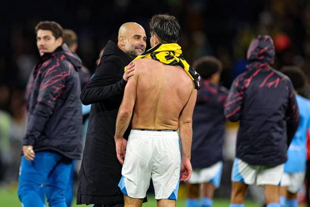 BSC Young Boys v Manchester City Champions League 25 10 2023. Pep Guardiola Manager of Manchester City congratulates Jack Grealish (10) of Manchester City at full time during the Champions League match between BSC Young Boys and Manchester City at Stade de Suisse, Wankdorf, Switzerland on 25 October 2023. Editorial use only , Copyright: xNigelxKeenex PSI-18264-0089