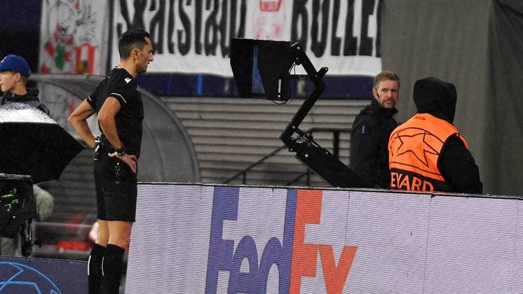 Soccer UEFA Champions League, 2023 2024 season, Group stage, Group G, Matchday 3, RB Leipzig vs Red Star Belgrade Sportsko drustvo Crvena zvezda 3 1 1 0 25 10 2023 Referee José María Sánchez Spain looks at a screen to review a VAR call during the match RB Leipzig vs Red Star Belgrade Sportsko drustvo Crvena zvezda 25 10 2023 Leipzig Saxony Germany Red Bull Arena