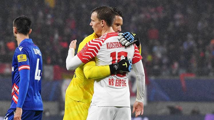 Soccer UEFA Champions League, 2023 2024 season, Group stage, Group G, Matchday 3, RB Leipzig vs Red Star Belgrade Sportsko drustvo Crvena zvezda 3 1 1 0 25 10 2023 Janis Blaswich Goalkeeper RB Leipzig, back number 21, 21 left and Lukas Klostermann Right defender RB Leipzig, back number 16, 16 right hug each other after the match RB Leipzig vs Red Star Belgrade Sportsko drustvo Crvena zvezda 25 10 2023 He raises his arms in the air Leipzig Saxony Germany Red Bull Arena