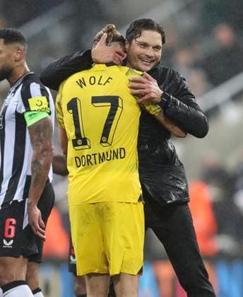 Football - 2023 2024 UEFA Champions League - Newcastle United vs Borussia Dortmund - St Jame™s Park - Wednesday 25th October 2023 Borussia Dortmund manager Edin Terzic and Marius Wolf of Borussia Dortmund are seen at full time 