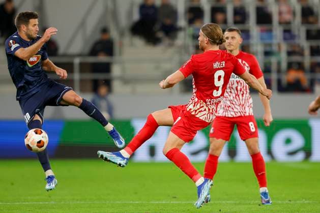 Serbia, Backa Topola, 26 10 2023, , TSC Backa Topola SC Freiburg UEFA Europa League 2023 2024 Group A, Nemanja Petrovic TSC Backa Topola and Lucas Hoeler SC Freiburg controls the ball Backa Topola  eu-images-084
