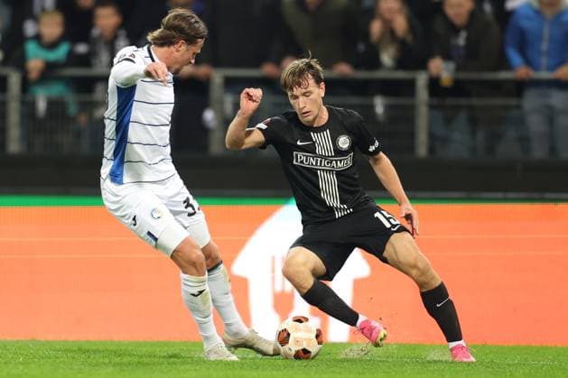 SOCCER - UEFA EL, Sturm vs Atalanta GRAZ,AUSTRIA,26.OCT.23 - SOCCER - UEFA Europa League, SK Sturm Graz vs Atalanta Bergamo Calcio. Image shows Emil Holm (Atalanta) and William Boeving (Sturm).  GEPAxpictures xChrisxBauer