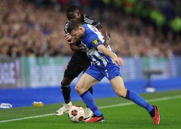 Brighton and Hove, England, 26th October 2023. James Milner of Brighton and Hove Albion and Carlos Forbs of Ajax challenge for the ball during the UEFA Europa League match at the AMEX Stadium, Brighton and Hove. Picture credit should read: Paul Terry Sportimage EDITORIAL USE ONLY. No use with unauthorised audio, video, data, fixture lists, club league logos or live services. Online in-match use limited to 120 images, no video emulation. No use in betting, games or single club league player publications. SPI-2677-0014