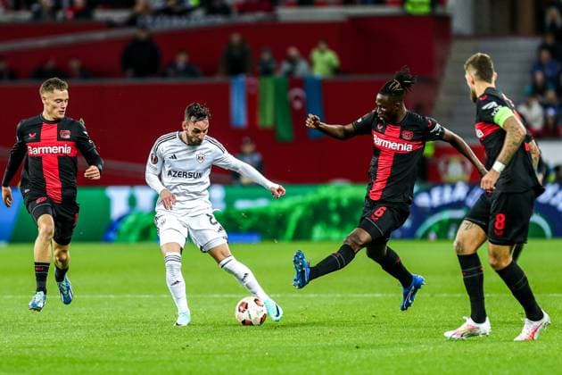 Marco Jankovic Qarabag Agdam, 08 in duel against Odilon Kossounou Bayer 04 Leverkusen, 06 , GER, Bayer 04 Leverkusen vs Qarabag Agdam, UEFA Europa League 2023 24, group stage, match day 3, 26 10 2023, GER, Bayer 04 Leverkusen vs Qarabag Agdam, UEFA Europa League 2023 24, group stage, match day 3, 26 10 2023, Photo Eibner Press Photo Gabriel Boia Leverkusen. Copyright: xGabrielxBoiax EP_EER