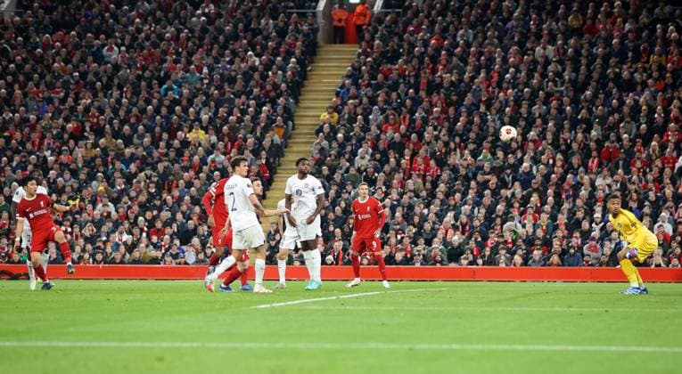 26th October 2023; Anfield, Liverpool, Merseyside, England; Europa League Football, Liverpool versus Toulouse; Wataru Endo of Liverpool beats Guillaume Restes of Toulouse with header to give his side a 2-1 lead after 30 minutes  ActionPlus12569186 DavidxBlunsden