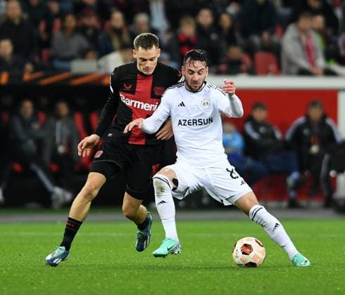 26 10 2023, Leverkusen, Germany, BayARENA, Bayer Leverkusen vs Qarabag Agdam UEFA Europa League 2023 2024 Group H, Florian Wirtz Bayer 04 Leverkusen and Marko Jankovic Qarabag Agdam in a duel Photo Ralf Treese Leverkusen BayARENA North Rhine Westphalia Germany 521_LEVQAR20231026_021 Treese-521