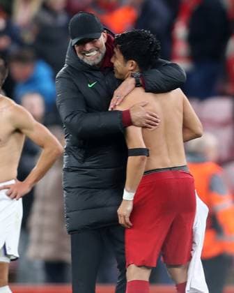 26th October 2023; Anfield, Liverpool, Merseyside, England; Europa League Football, Liverpool versus Toulouse; Liverpool manager Jurgen Klopp hugs Wataru Endo at full time  ActionPlus12569264 DavidxBlunsden
