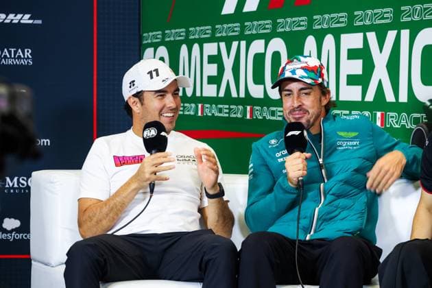 PEREZ Sergio (mex), Red Bull Racing RB19, ALONSO Fernando (spa), Aston Martin F1 Team AMR23, portrait during the 2023 Formula 1 Grand Premio de la Ciudad de Mexico, 19th round of the 2023 Formula One World Championship, WM, Weltmeisterschaft from October 27 to 29, 2023 on the Autodromo Hermanos Rodriguez, in Mexico City, Mexico - F1 - MEXICO CITY GRAND PRIX 2023 DPPI Panoramic  00123042_G0OD1142