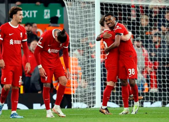 Football - 2023 2024 UEFA Europa League - Group E - Matchday Three Six - Liverpool vs Toulouse - Anfield - Thursday 26th October 2023 Ryan Gravenberch of Liverpool celebrates with Harvey Elliott after he scores to put his team 4-1 ahead, at Anfield. 