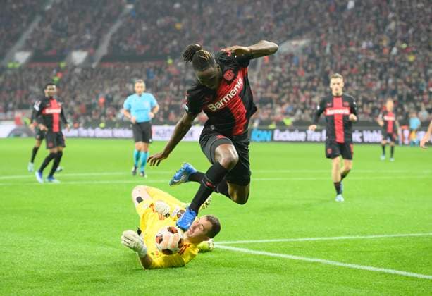 Odilon KOSSOUNOU LEV above in duel against goalkeeper Andrey Lunev Agdam , action, duel, Football Europa League, group stage, matchday 3, Bayer 04 Leverkusen LEV Qarabag Agdam, on 26 10 2023 in Leverkusen Germany UEFA regulations prohibit any use of photographs as image sequences and or quasi video Â