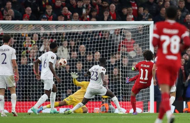 26th October 2023; Anfield, Liverpool, Merseyside, England; Europa League Football, Liverpool versus Toulouse; Mohammed Salah of Liverpool beats Guillaume Restes of Toulouse to make the score 5-1 after 3 minutes of added time  ActionPlus12569305 DavidxBlunsden
