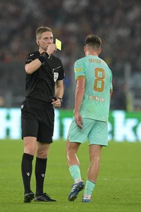 26th October 2023, Stadio Olimpico, Rome, Italy; Europa League Football; Roma versus Slavia Prague; Referee Espen Eskas shows a yellow card to Lukas Masopust of Slavia Prague  ActionPlus12569332 AllShotLive