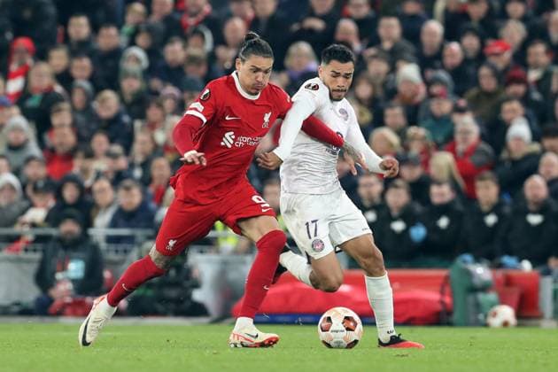 26th October 2023; Anfield, Liverpool, Merseyside, England; Europa League Football, Liverpool versus Toulouse; Darwin Nunez of Liverpool is tackled by Gabriel Suazo of Toulouse  ActionPlus12569368 DavidxBlunsden