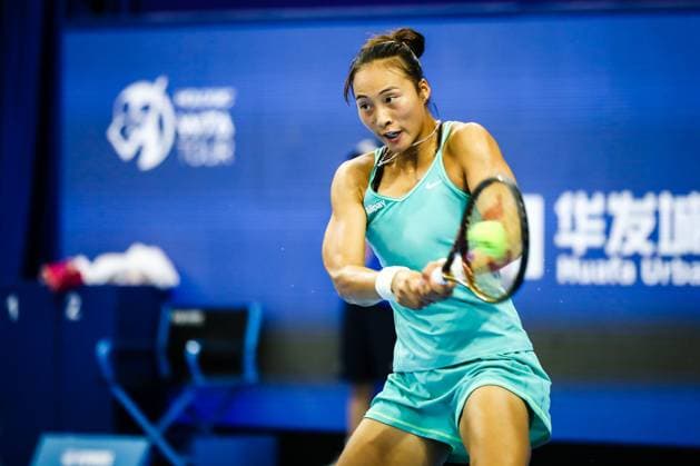 ZHUHAI, CHINA - OCTOBER 28: Zheng Qinwen of China returns a shot in the Women s Singles semi-final match against Zhu Lin of China on day five of WTA, Tennis Damen Elite Trophy Zhuhai 2023 at Hengqin International Tennis Center on October 28, 2023 in Zhuhai, Guagdong Province of China.  Copyright: xVCGx 111461631314