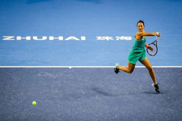 ZHUHAI, CHINA - OCTOBER 28: Zheng Qinwen of China returns a shot in the Women s Singles semi-final match against Zhu Lin of China on day five of WTA, Tennis Damen Elite Trophy Zhuhai 2023 at Hengqin International Tennis Center on October 28, 2023 in Zhuhai, Guagdong Province of China.  Copyright: xVCGx 111461631509