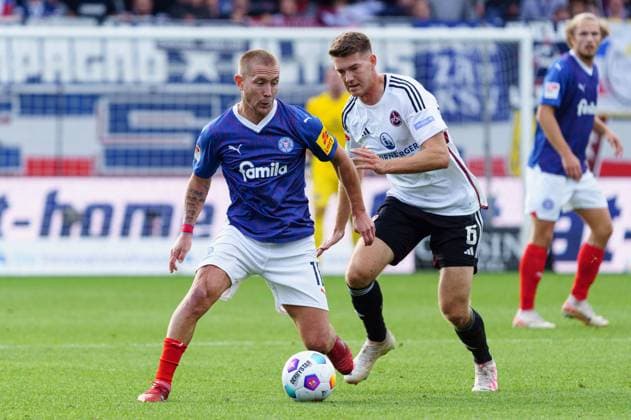 Lewis Holtby Holstein Kiel, 10 , Florian Flick 1 FC Nuernberg, 06 GER, Holstein Kiel vs 1 FC Nuernberg, Football, 2 Bundesliga, Matchday 11, Season 2023 2024, 29 10 2023 DFL REGULATES PROHIBIT ANY USE OF PHOTOGRAPHS AS IMAGE SEQUENCES AND OR QUASI VIDEO GER, Holstein Kiel vs 1 FC Nuernberg, Football, 2 Bundesliga, Matchday 11, Season 2023 2024, 29 10 2023 Kiel Copyright: xEibner-Pressefoto MarcelxvonxFehrnx EP_MFN