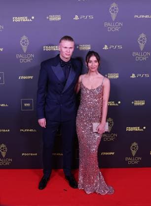 (231031) -- PARIS, Oct. 31, 2023 -- Manchester City s Norwegian forward Erling Haaland (L) and Isabel Haugseng Johansen arrive at the red carpet of the 2023 Ballon d Or France Football award ceremony at the Theatre du Chatelet in Paris on Oct. 30, 2023. ) (SP)FRANCE-PARIS-FOOTBALL-BALLON D OR CEREMONY GaoxJing 