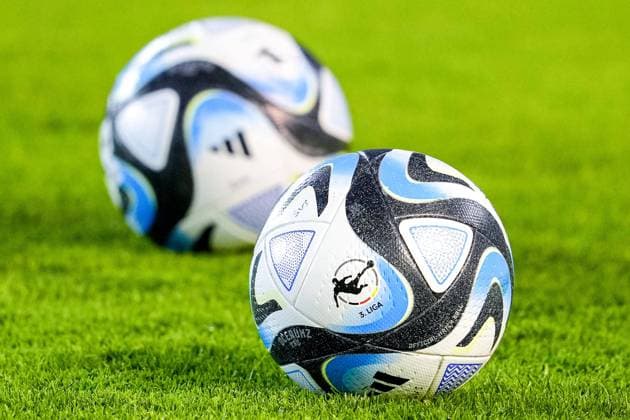 A ball of the brand adidas Oceaunz Pro, Competition Ball lies on the lawn and shows the logo of the 3 Liga, league logo, balls, footballs, official match ball, official Match Ball, symbol photo, symbol picture, symbol, 01 11 2023, Sandhausen Germany , soccer, DFB Pokal, 2 round, SV Sandhausen Bayer 04 Leverkusen, DFB DFL REGULATIONS PROHIBIT ANY USE OF PHOTOGRAPHS AS IMAGE SEQUENCES AND OR QUASI VIDEO xozx