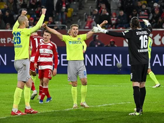 Aleksandar Vukotic SV Wehen Wiesbaden, 26 , Marcus Mathisen SV Wehen Wiesbaden, 24 and Florian Strietzel SV Wehen Wiesbaden, 16 celebrate their victory Cristos Tzolis Fortuna Duesseldorf, 07 is disappointed Fortuna Duesseldorf vs SV Wehen Wiesbaden, Soccer, 2 Bundesliga, 12 Matchday, Season 2023 2024, 03 11 2023 DFB DFL Regulations prohibit any use of Photographs as image sequences and or quasi video Fortuna Duesseldorf vs SV Wehen Wiesbaden, Football, 2 Bundesliga, 12 Matchday, Season 2023 2024, 03 11 2023 Duesseldorf Copyright: xEibner-Pressefoto ThomasxHaeslerx EP_THR