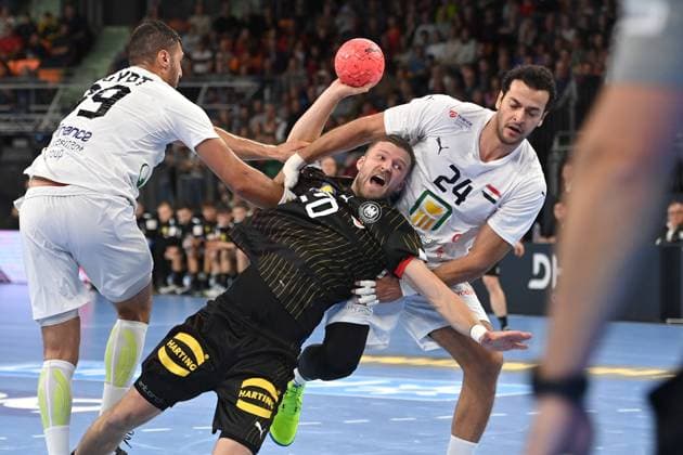 Philipp WEBER GER , action,duel against Yehia ELDERAA EGY and Ibrahim ELMASRY EGY,re , handball international Germany GER Egypt EGY 31 31 on 03 11 2023 ratiopharm arena Neu Ulm