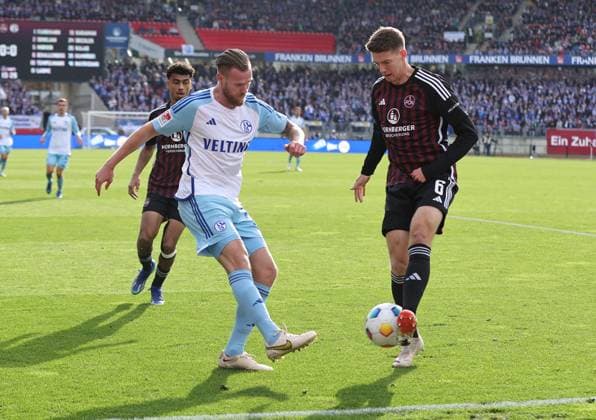 04 11 2023 Soccer Season 2023 2024 2 Soccer Bundesliga 12 Matchday 1 FC Nuremberg FCN Club FC Schalke 04 S04 Knappen Sportfoto Zink DaMa xdaxmax DFL regulations prohibit any use of photographs as image sequences and or quasi video only for editorial use Tomas Kalas 26, FC Schalke 04 S04 Florian Flick 6, 1 FC Nuremberg FCN