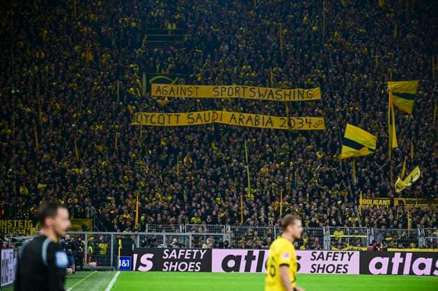 Banner Protest against the World Cup 2034 in Saudi Arabia , Borussia Dortmund vs FC Bayern Muenchen, Football, 1 Bundesliga, 10 Matchday, 04 11 2023 DFB regulations prohibit any use of photographs as image sequences and or quasi video Dortmund Nordrhein Westfalen Germany Copyright: xkolbert-press MarcxNiemeyerx