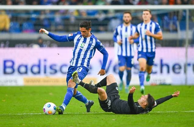 Lars Stindl Karlsruher SC, 13 is on the ball, on the right Florent Muslija SC Paderborn, 30 falls to the ground, GER, Karlsruher SC vs SC Paderborn, Sport, Football, Men, 2 Bundesliga, Matchday 12, Season 2023 2024, 05 11 2023, DFL REGULATES PROHIBIT ANY USE OF PHOTOGRAPHS AS IMAGE SEQUENCES AND OR QUASI VIDEO GER, Karlsruher SC vs SC Paderborn, Sport, Football, Men, 2 Bundesliga, Matchday 12, Season 2023 2024, 05 11 2023, Karlsruhe Copyright: xEibner-Pressefoto SilasxSchuellex EP_SSR