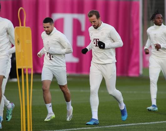 Munich, Germany 07 November 2023 Football, Men, Season 2023 2024, FC Bayern Munich, Säbener Strasse, Training ground, Training, Final training, Champions League Raphael Guerreiro FC Bayern Munich left with Harry Kane FC Bayern Munich right while running, warming up