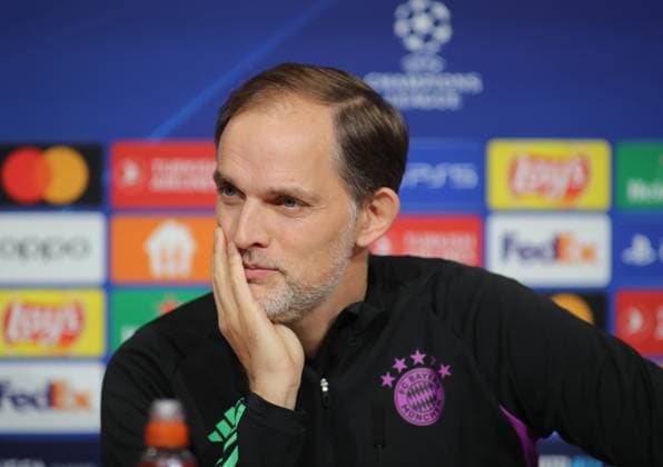 Munich, Germany 07 November 2023 Football, Men, Season 2023 2024, FC Bayern Munich, International Press Conference, Allianz Arena Thomas Tuchel, Coach FC Bayern Munich head, portrait, listening, hand on chin, looking to the right