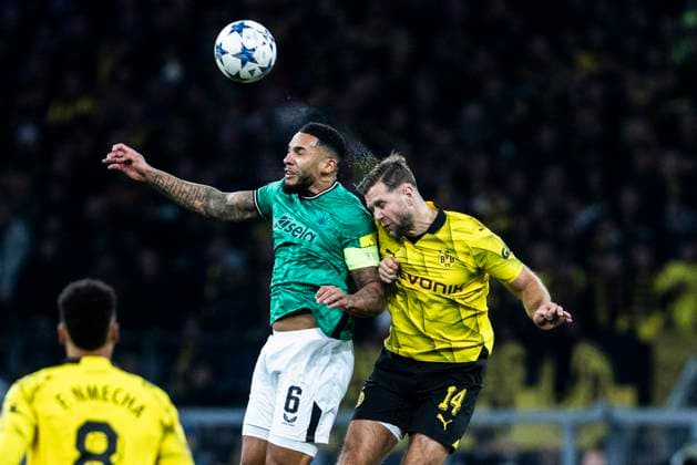 Dortmund, Signal Iduna Park, 07 11 23 Jamaal Lascelles Newcastle challenges Niclas Füllkrug Dortmund during the championsleague match between Borussia Dortmund vs Newcastle United