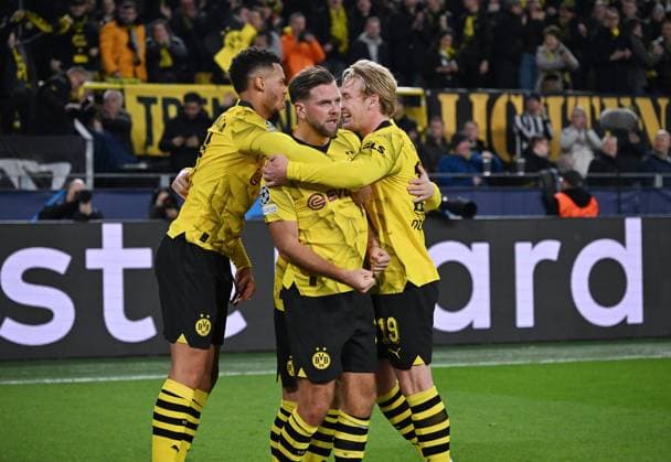 Celebration 1 0, Niclas Füllkrug Borussia Dortmund , mi , is celebrated by Felix Nmecha Borussia Dortmund , li , and Julian Brandt Borussia Dortmund 07 11 2023, Football Champions League, Season 2023 2024, Preliminary round, Matchday 4, Borussia Dortmund Newcastle United Dortmund Signal Iduna Park North Rhine-Westphalia Germany Team2