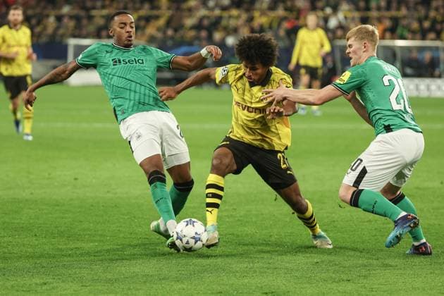 Champions League Borussia Dortmund Newcastle United on 07 11 2023 at Signal Iduna Park in Dortmund Karim Adeyemi Dortmund 27 vs Lewis Hall Newcastle 20 and Joe Willock Newcastle 28 MH