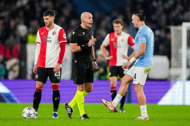 UEFA Champions League: S.S. Lazio v Feyenoord Rome - Referee Szymon Marciniak, Patric of Lazio during the 4th leg of the UEFA Champions League group stage between S.S. Lazio v Feyenoord at Stadio Olympico on 7 November 2023 in Rome, Italy. Copyright: xTomxBodex