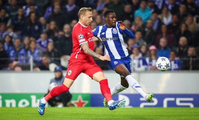Antwerp s Ritchie De Laet and Porto s Zaidu Sanusi fight for the ball during a game between Portuguese FC Porto and Belgian soccer team Royal Antwerp FC, on Tuesday 07 November 2023, in Porto, Portugal, on day four of the Champions League group stage, in the group H. VIRGINIExLEFOUR  x79481990x