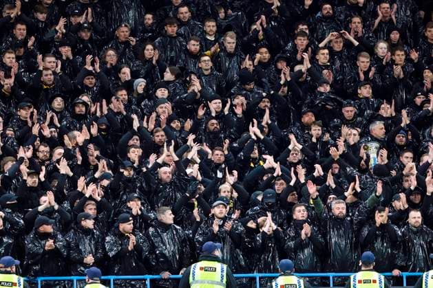Football - 2023 2024 UEFA Champions League - Group G - Matchday Four of Six - Manchester City vs Young Boys - Etihad Stadium - Tuesday 7th November 2023 Young Boys fans make light of the Manchester rain, at the Etihad. 