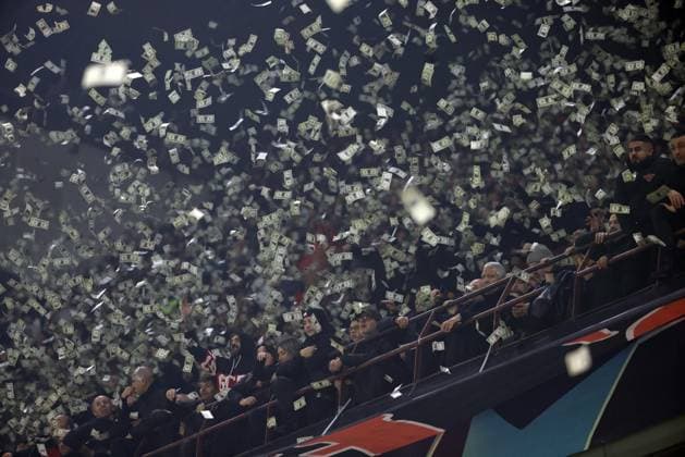 November 7, 2023, MILAN, ITALY: AC Milan fans throw fake dollars during he UEFA Champions League group F soccer match between Ac Milan and Paris Saint-German s at Giuseppe Meazza stadium in Milan, 7 November 2023..ANSA MATTEO BAZZI. Soccer; Champions League: Ac Milan vs Paris Saint-German s  - ZUMAa110 20231107_zaf_a110_038 Copyright: xMatteoxBazzix