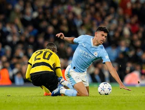 Manchester, England, 7th November 2023. Matheus Nunes of Manchester City with Cheikh Niasse of Young Boys during the UEFA Champions League, Group G match at the Etihad Stadium, Manchester. Picture credit should read: Andrew Yates Sportimage EDITORIAL USE ONLY. No use with unauthorised audio, video, data, fixture lists, club league logos or live services. Online in-match use limited to 120 images, no video emulation. No use in betting, games or single club league player publications. SPI-2717-0045