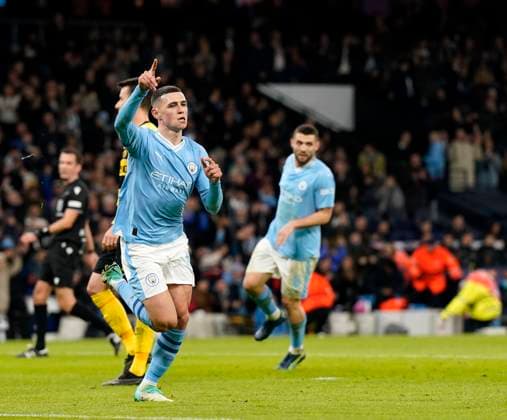 Manchester, England, 7th November 2023. Phil Foden of Manchester City celebrates scoring his sides second goal during the UEFA Champions League, Group G match at the Etihad Stadium, Manchester. Picture credit should read: Andrew Yates Sportimage EDITORIAL USE ONLY. No use with unauthorised audio, video, data, fixture lists, club league logos or live services. Online in-match use limited to 120 images, no video emulation. No use in betting, games or single club league player publications. SPI-2717-0051