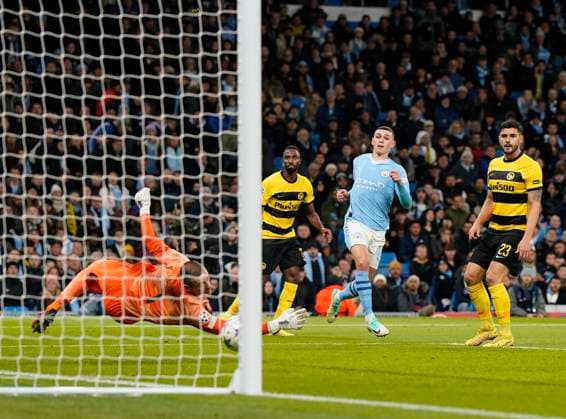 Manchester, England, 7th November 2023. Phil Foden of Manchester City scoring his sides second goal during the UEFA Champions League, Group G match at the Etihad Stadium, Manchester. Picture credit should read: Andrew Yates Sportimage EDITORIAL USE ONLY. No use with unauthorised audio, video, data, fixture lists, club league logos or live services. Online in-match use limited to 120 images, no video emulation. No use in betting, games or single club league player publications. SPI-2717-0052