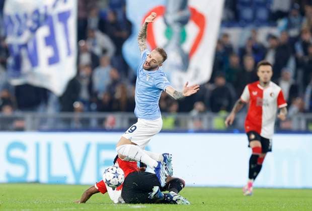 Italy, Rome, 07 11 2023, Olimpico Stadium, SS Lazio vs Feyenoord UEFA Champions League Group E, Quinten Timber Feyenoord and Manuel Lazzari SS Lazio battle for the ball Rome Olimpico Stadium Italy  eu-images-569