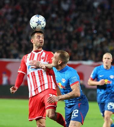 Red Star Belgrade RB Leipzig Champions League Beograd, 07 11 2023, Stadion Rajko Mitic, Football , UEFA Champions League, Group G , Matchday 4 , Red Star Belgrade vs RB Leipzig , Pictured from left Srdjan Mijailovic 33, Belgrade and David Raum 22, RB Leipzig , Photo for editorial use only , UEFA regulations prohibit any use of photographs as image sequences and or quasi video ,
