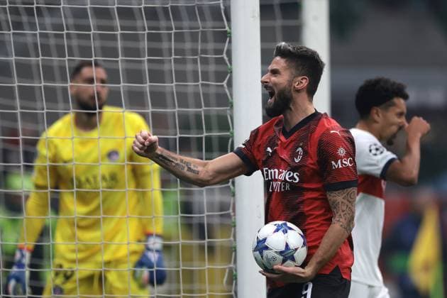 Milan, Italy, 7th November 2023. Olivier Giroud of AC Milan celebrates after team mate Rafael Leao scored to level the game at 1-1 during the UEFA Champions League match at Giuseppe Meazza, Milan. Picture credit should read: Jonathan Moscrop Sportimage EDITORIAL USE ONLY. No use with unauthorised audio, video, data, fixture lists, club league logos or live services. Online in-match use limited to 120 images, no video emulation. No use in betting, games or single club league player publications. SPI-2699-0017