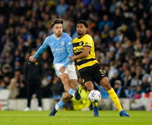 Manchester, England, 7th November 2023. Jack Grealish of Manchester City with Saidy Janko of Young Boys during the UEFA Champions League, Group G match at the Etihad Stadium, Manchester. Picture credit should read: Andrew Yates Sportimage EDITORIAL USE ONLY. No use with unauthorised audio, video, data, fixture lists, club league logos or live services. Online in-match use limited to 120 images, no video emulation. No use in betting, games or single club league player publications. SPI-2717-0070
