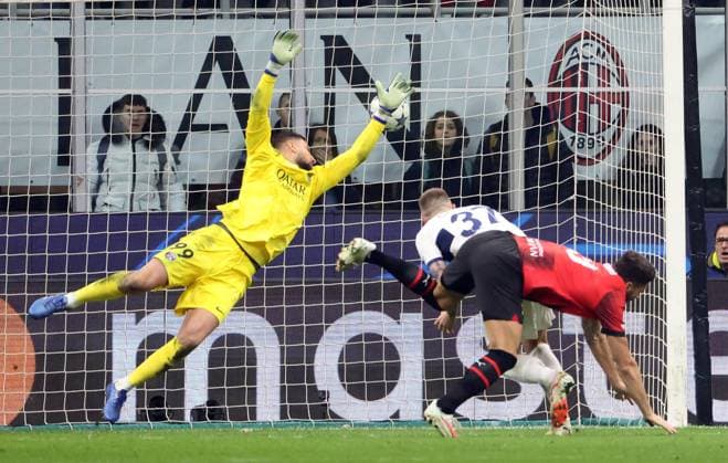 November 7, 2023, MILAN, ITALY: AC Milan s Olivier Giroud (R) scores goal of 2 to 1 against Paris Saint-German s goalkeeper Gianluigi Donnarumma during he UEFA Champions League group F soccer match between Ac Milan and Paris Saint-German s at Giuseppe Meazza stadium in Milan, 7 November 2023..ANSA MATTEO BAZZI. Soccer; Champions League: Ac Milan vs Paris Saint-German  - ZUMAa110 20231107_zaf_a110_049 Copyright: xMatteoxBazzix