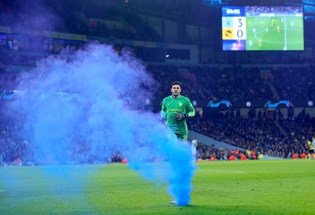 Manchester City v BSC Young Boys: Group G - UEFA Champions League 2023 24 Ederson, goalkeeper of Manchester City runs back to goal with Blue flare on pitch during the UEFA Champions League match between Manchester City and BSC Young Boys at Etihad Stadium on November 7, 2023 in Manchester, United Kingdom. Manchester Etihad Stadium England United Kingdom Copyright: xNigelxFrench Sportsphoto APLx 13959907