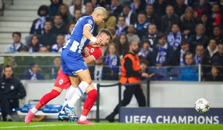 Porto s Pepe and Antwerp s Arbnor Muja fight for the ball during a game between Portuguese FC Porto and Belgian soccer team Royal Antwerp FC, on Tuesday 07 November 2023, in Porto, Portugal, on day four of the Champions League group stage, in the group H. VIRGINIExLEFOUR  x79487688x