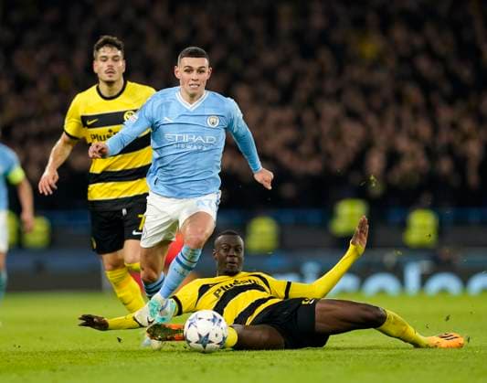 Manchester, England, 7th November 2023. Phil Foden of Manchester City tussles with Cheikh Niasse of Young Boys during the UEFA Champions League, Group G match at the Etihad Stadium, Manchester. Picture credit should read: Andrew Yates Sportimage EDITORIAL USE ONLY. No use with unauthorised audio, video, data, fixture lists, club league logos or live services. Online in-match use limited to 120 images, no video emulation. No use in betting, games or single club league player publications. SPI-2717-0080