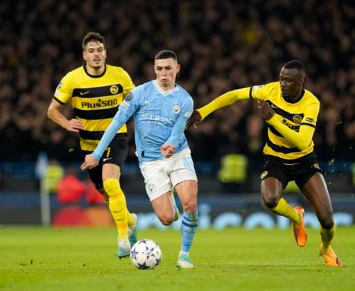 Manchester, England, 7th November 2023. Phil Foden of Manchester City tussles with Cheikh Niasse of Young Boys during the UEFA Champions League, Group G match at the Etihad Stadium, Manchester. Picture credit should read: Andrew Yates Sportimage EDITORIAL USE ONLY. No use with unauthorised audio, video, data, fixture lists, club league logos or live services. Online in-match use limited to 120 images, no video emulation. No use in betting, games or single club league player publications. SPI-2717-0082